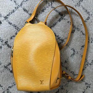 Louis Vuitton- Gold Backpack